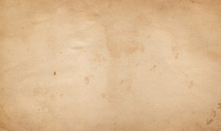 Aged dirty paper background for the design. Natural old paper texture.